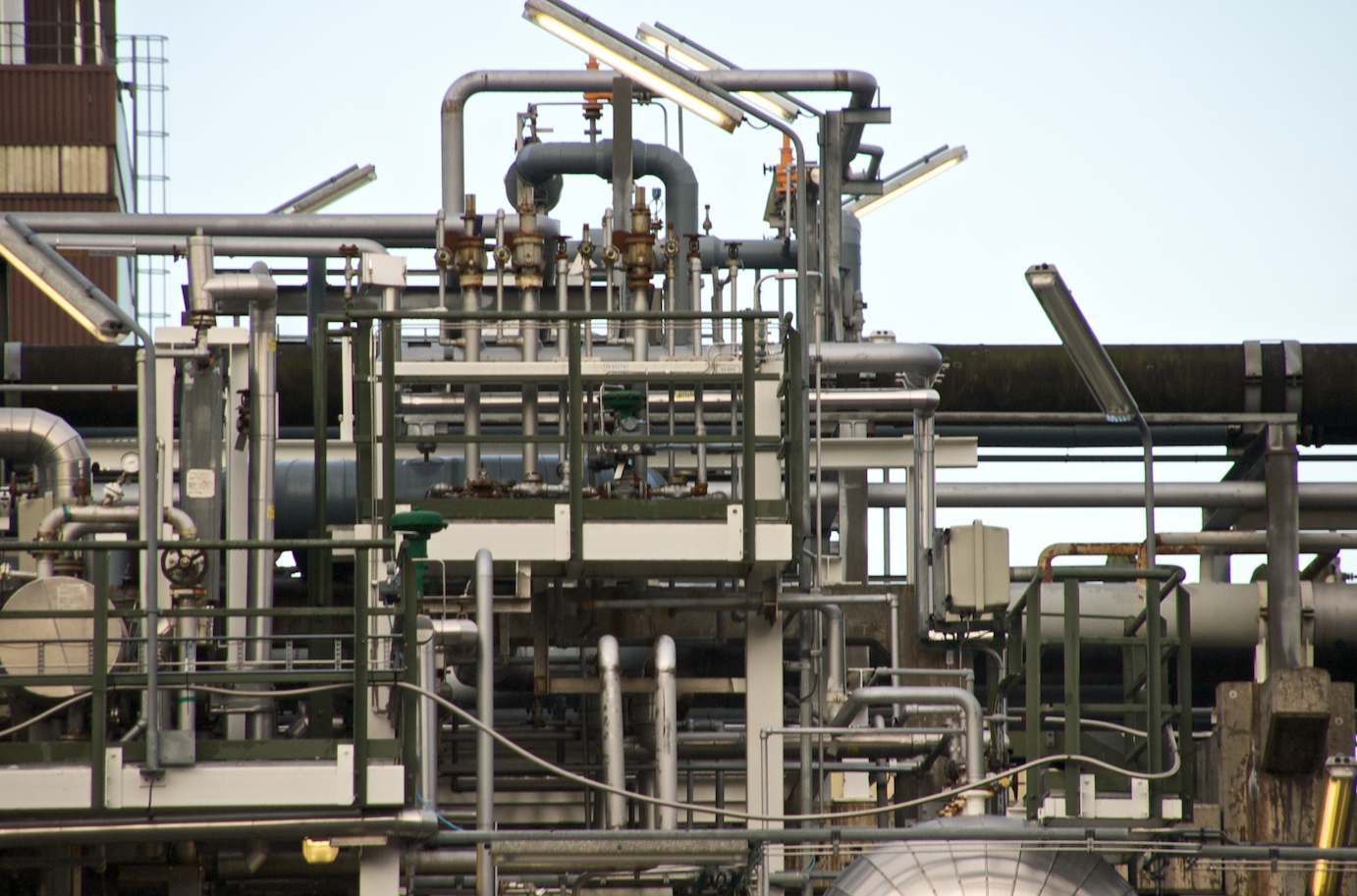 Process piping, valves and walkways on an industrial plant structure