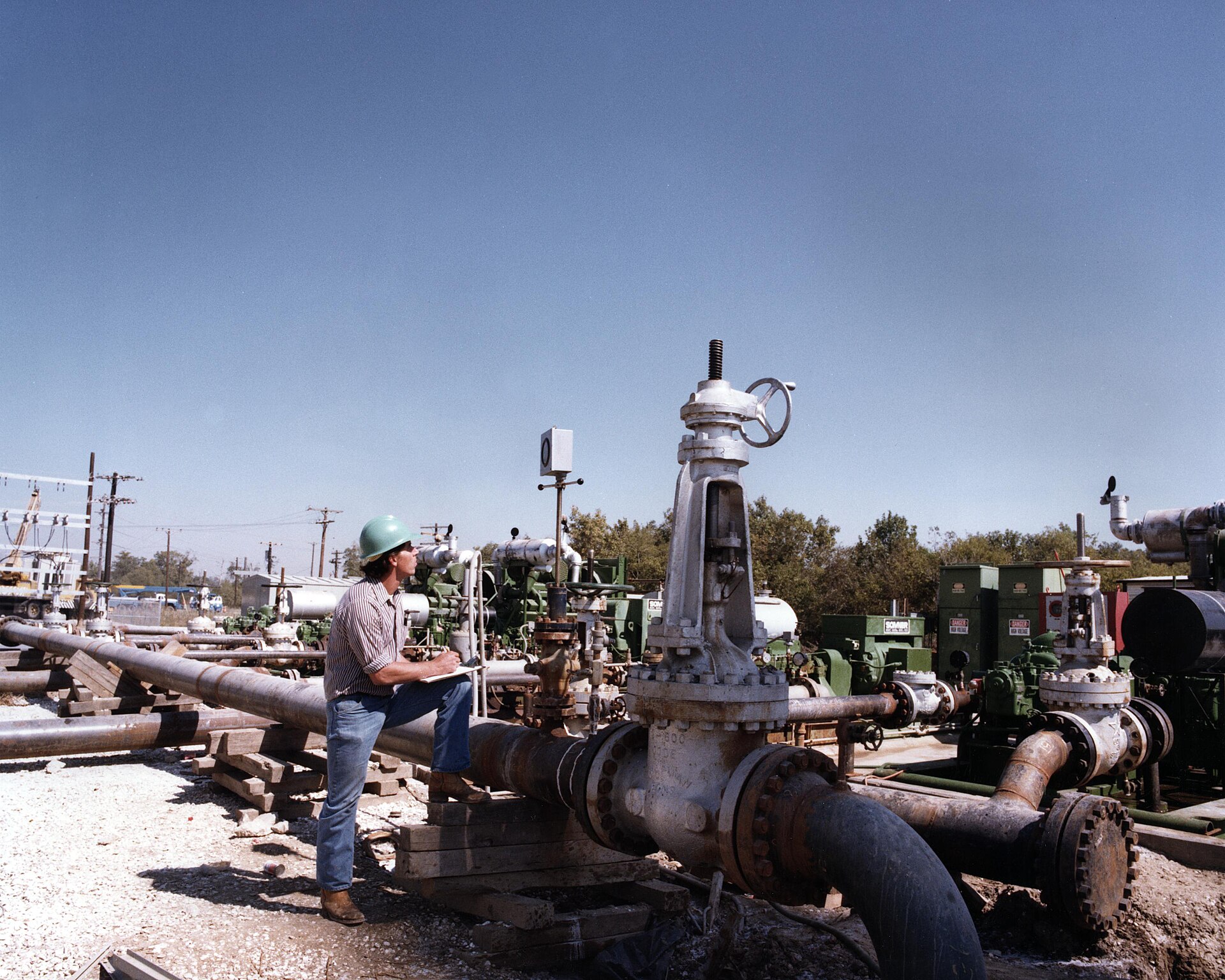 Large storage tanks and process piping at a strategic petroleum reserve site