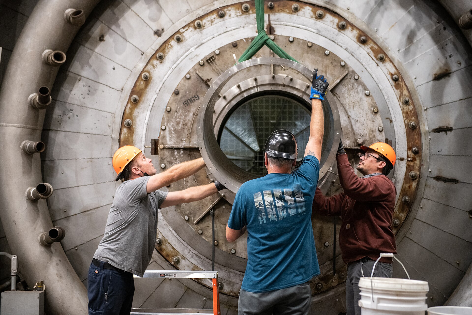 Engineers documenting hardware during a laboratory test